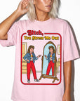 A woman wearing a pink t-shirt with a graphic design depicting a woman in a mirror, with text above the image that says "Bitch, You Stress Me Out".